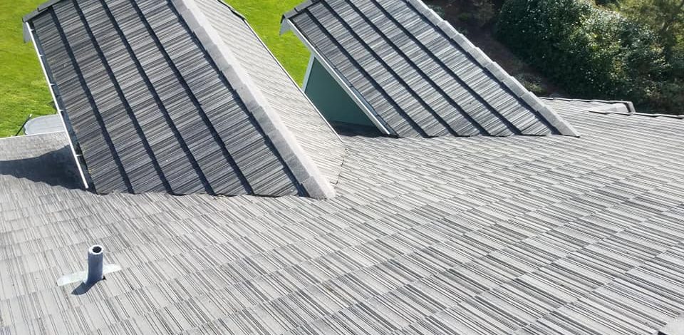 a hand cleaned tile roof